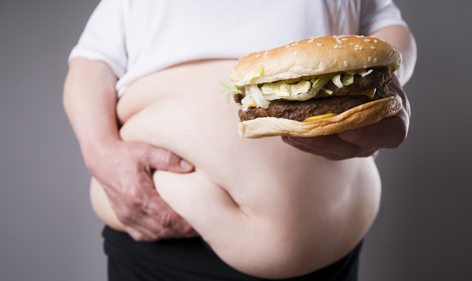 Постоянный голод в желудке. Ожирение. Ожирение от фаст фуда. Избыточный вес. Неправильное питание и ожирение.